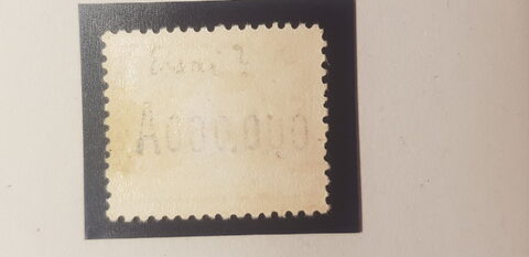 Segunda foto del sello sin identificar: Alfonso XIII  tipo vaquer 25c  negro y numeración ceros.